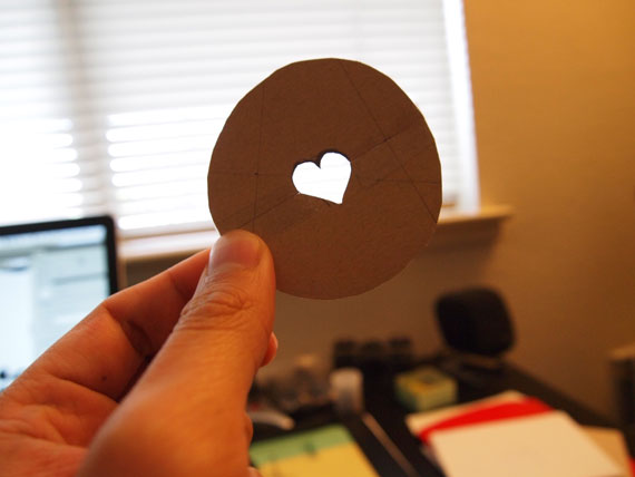 then you cut that shape out! and tape it to the other thing that you made that was all cut up